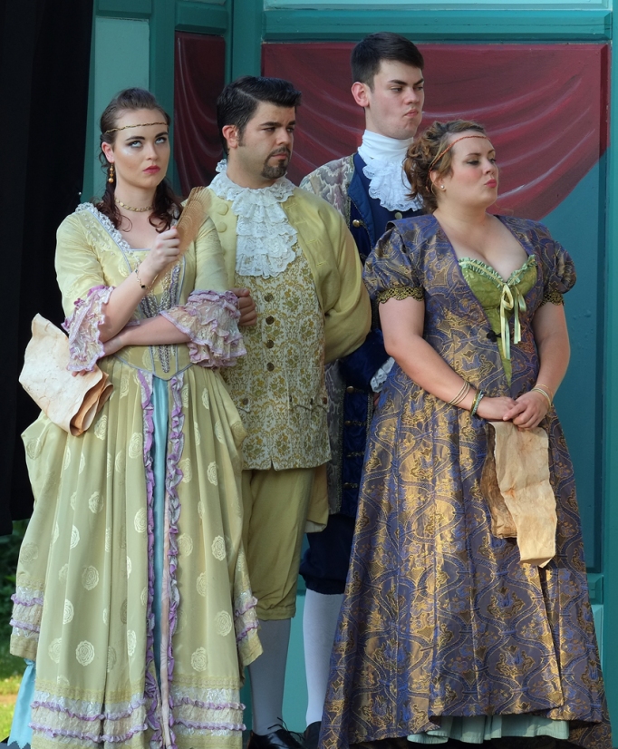 Regan and Goneril show disdain for Cordelia's declaration. Albany (Casey Fero - center left) and Cornwall (Patrick Siegmund - center right) look on.