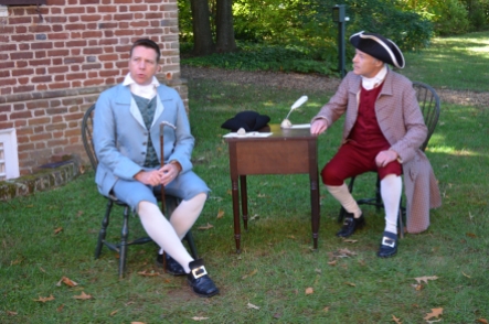Charles and Fielding discuss how to fund the Patriot gun factory they have been made responsible for by the Virginia Convention.