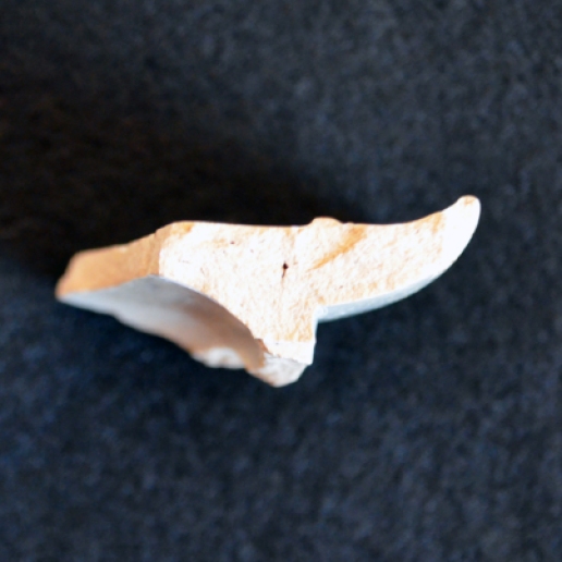 A profile view of one of the patch stand fragments.