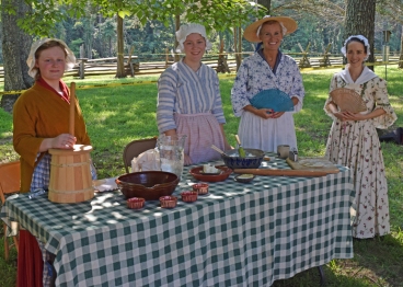 Living historians ready to demonstrate butter churning and other foodways.